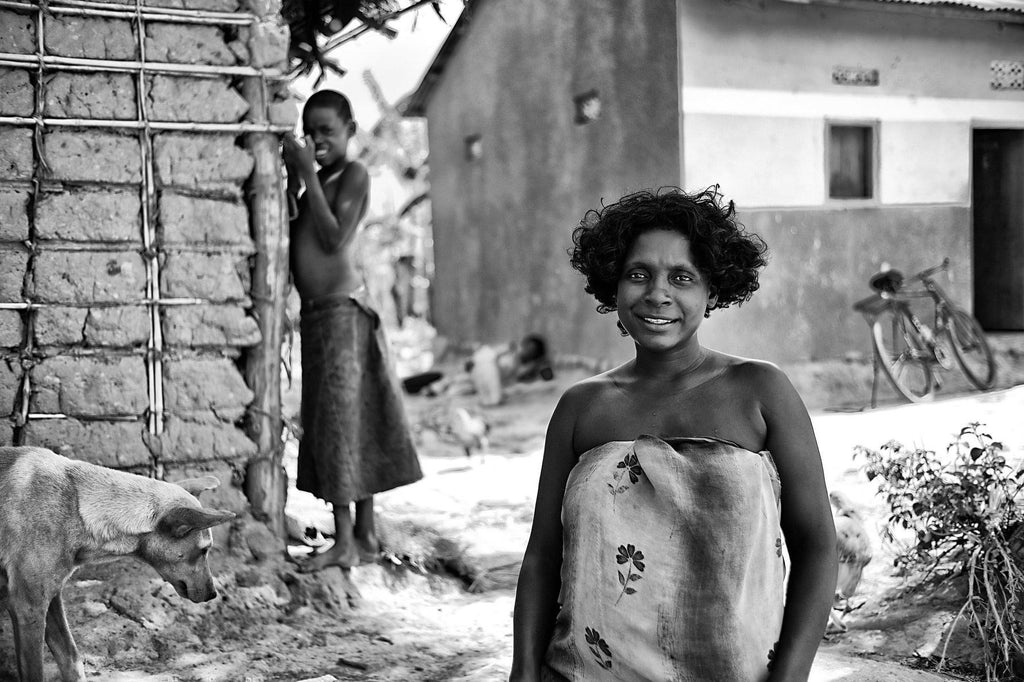 Woman in Front Yard - Uganda